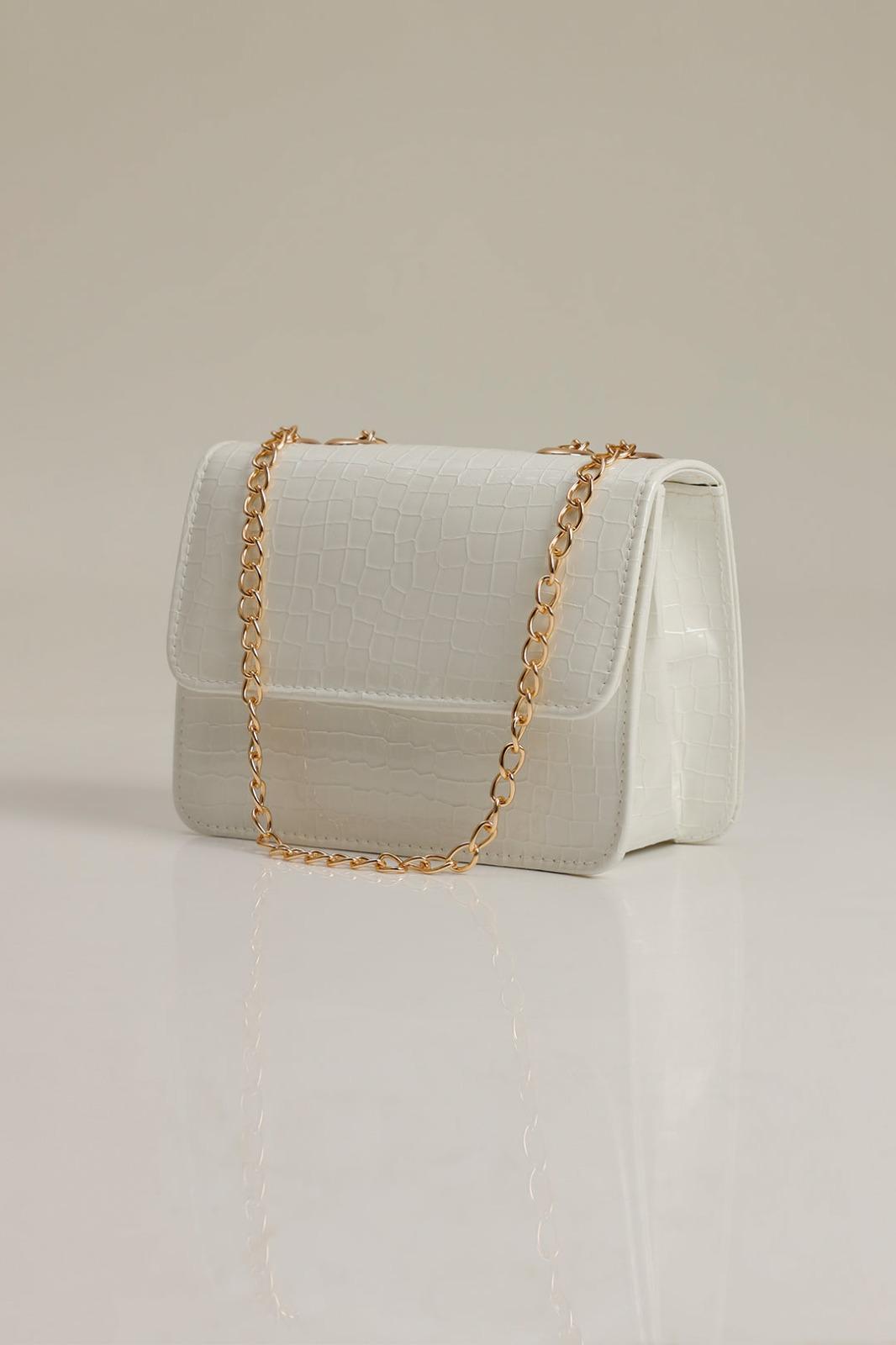 Woman's white pu leather crossboby bag